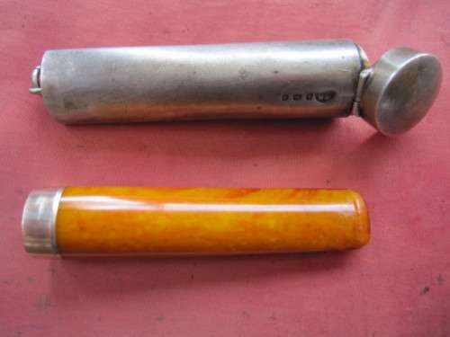 VINTAGE SILVER CIGAR CASE WITH GOLD RIM AND AMBER HOLDER